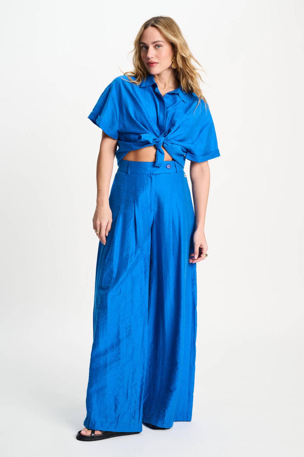 Blauwe dames POM Amsterdam wide leg high waist broek van lyocell met rits- en knoopsluiting en effen