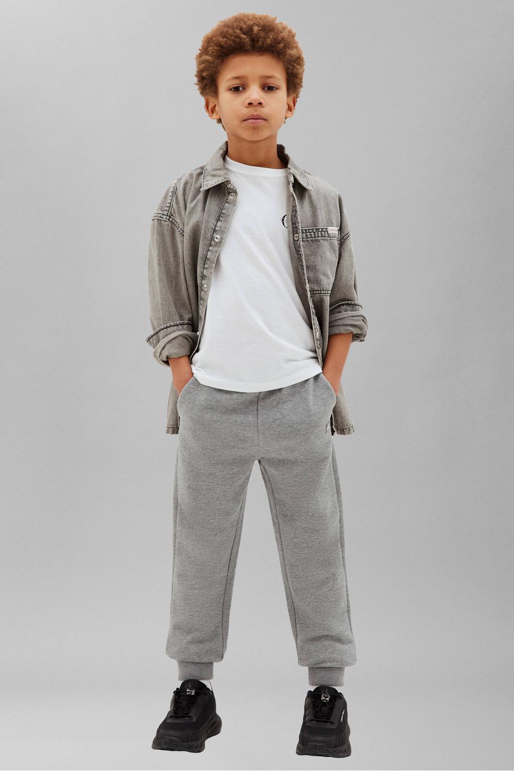 Grijs melange jongens en meisjes Calvin Klein sweat joggingbroek met elastische tailleband met koord en effen