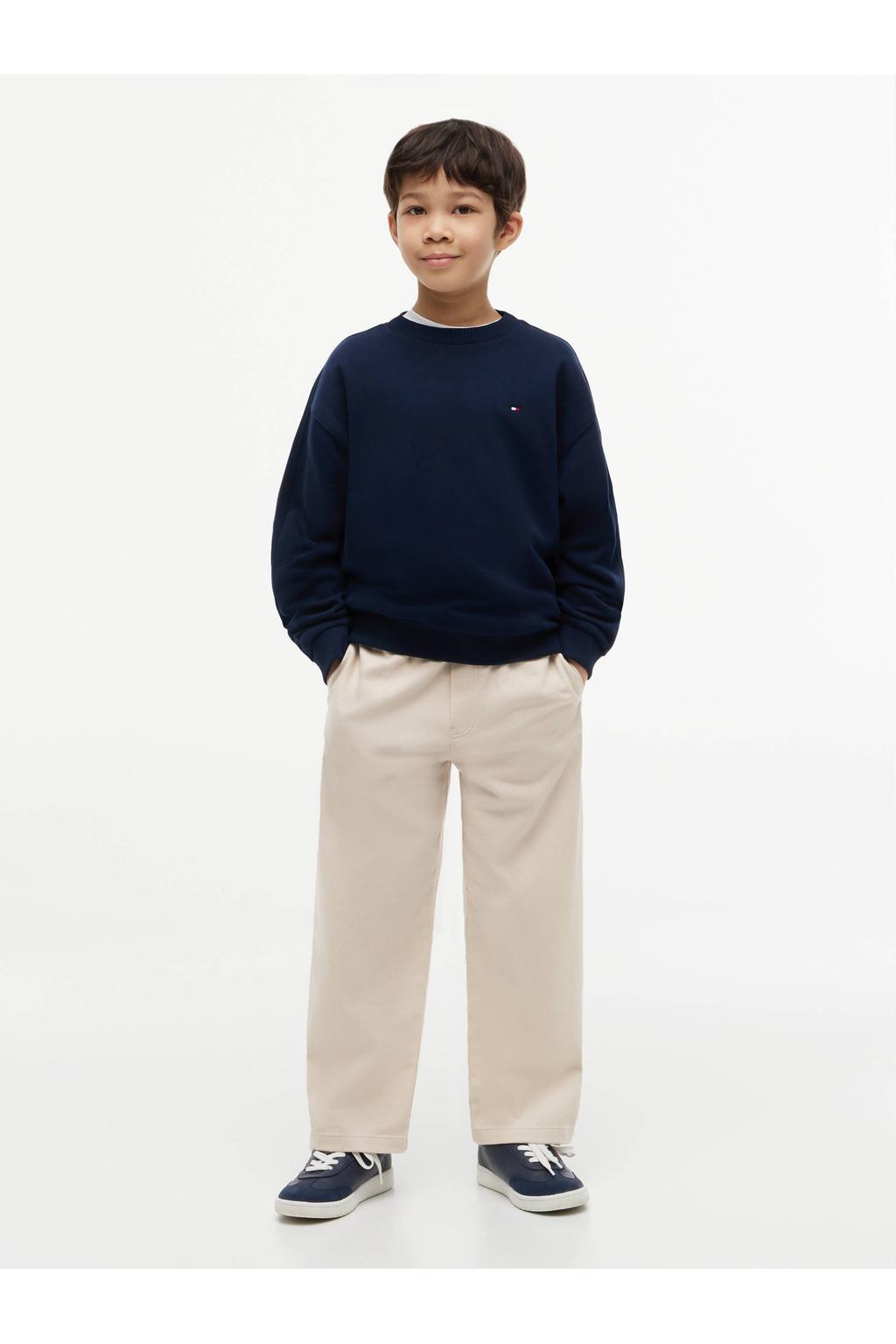 Donkerblauwe jongens Tommy Hilfiger sweater met logo dessin, lange mouwen, ronde hals en geribde boorden