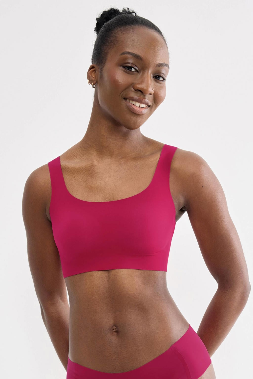 sloggi ZERO Feel voorgevormde seamless T-shirt-bh zonder beugel - koraalrood