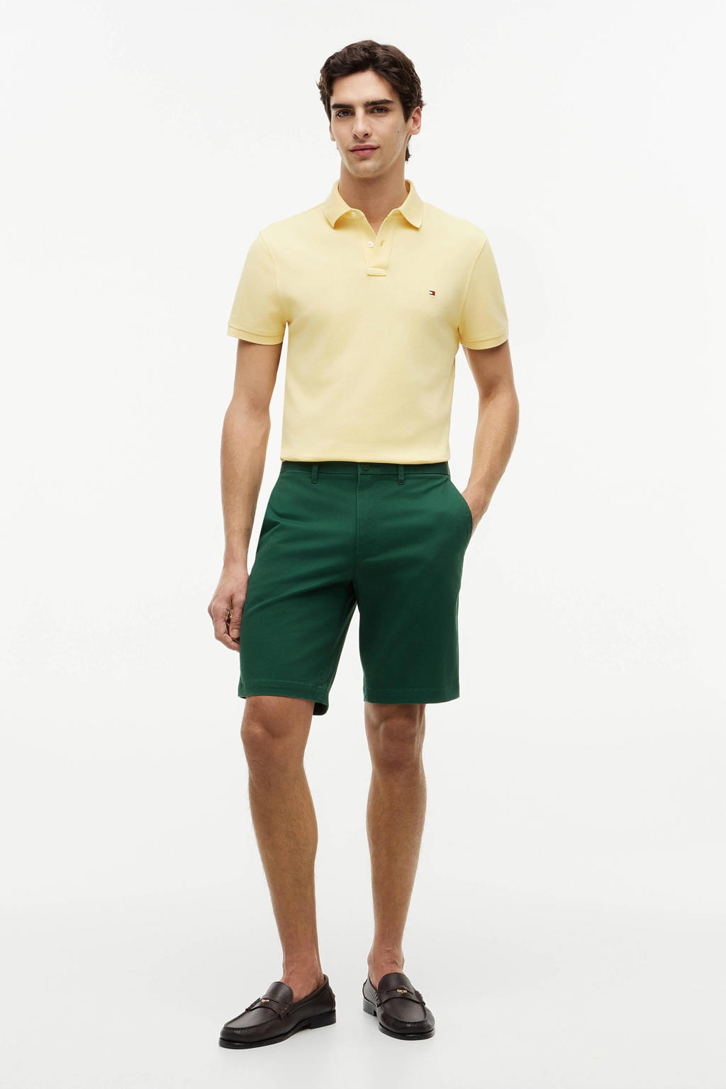 Lichtgele heren Tommy Hilfiger regular polo van katoen met effen, korte mouwen, knoopsluiting en pique