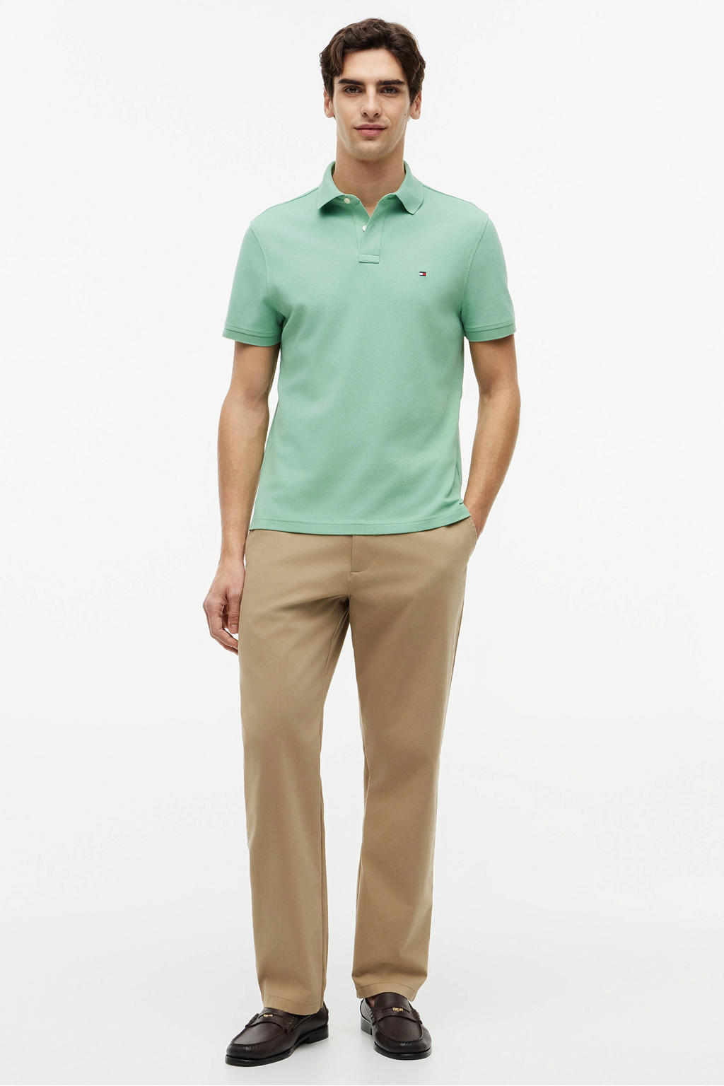 Lichtgroene heren Tommy Hilfiger regular polo van katoen met effen, korte mouwen en knoopsluiting
