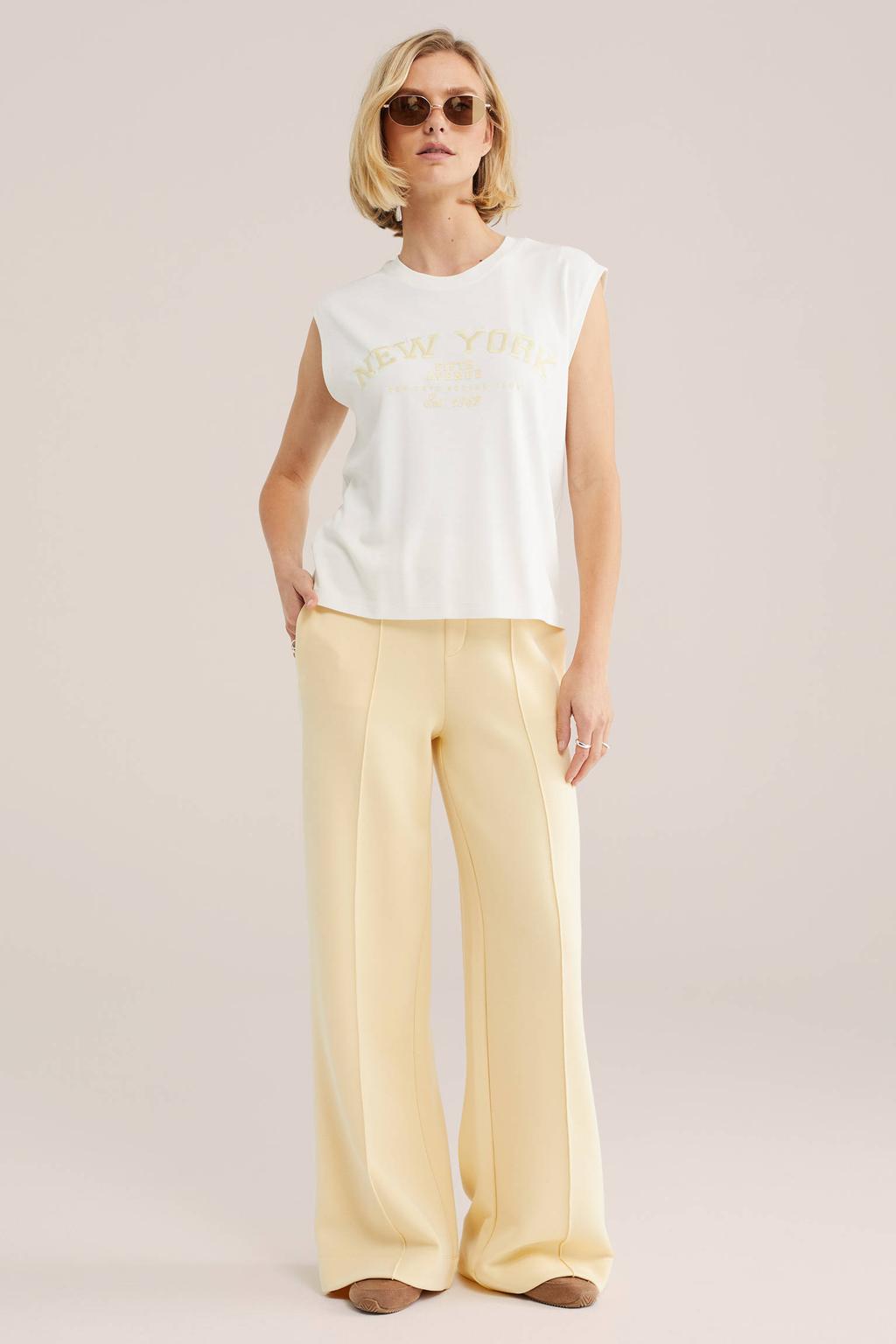 Wit en gele dames WE Fashion top van viscose met effen, korte mouwen en ronde hals