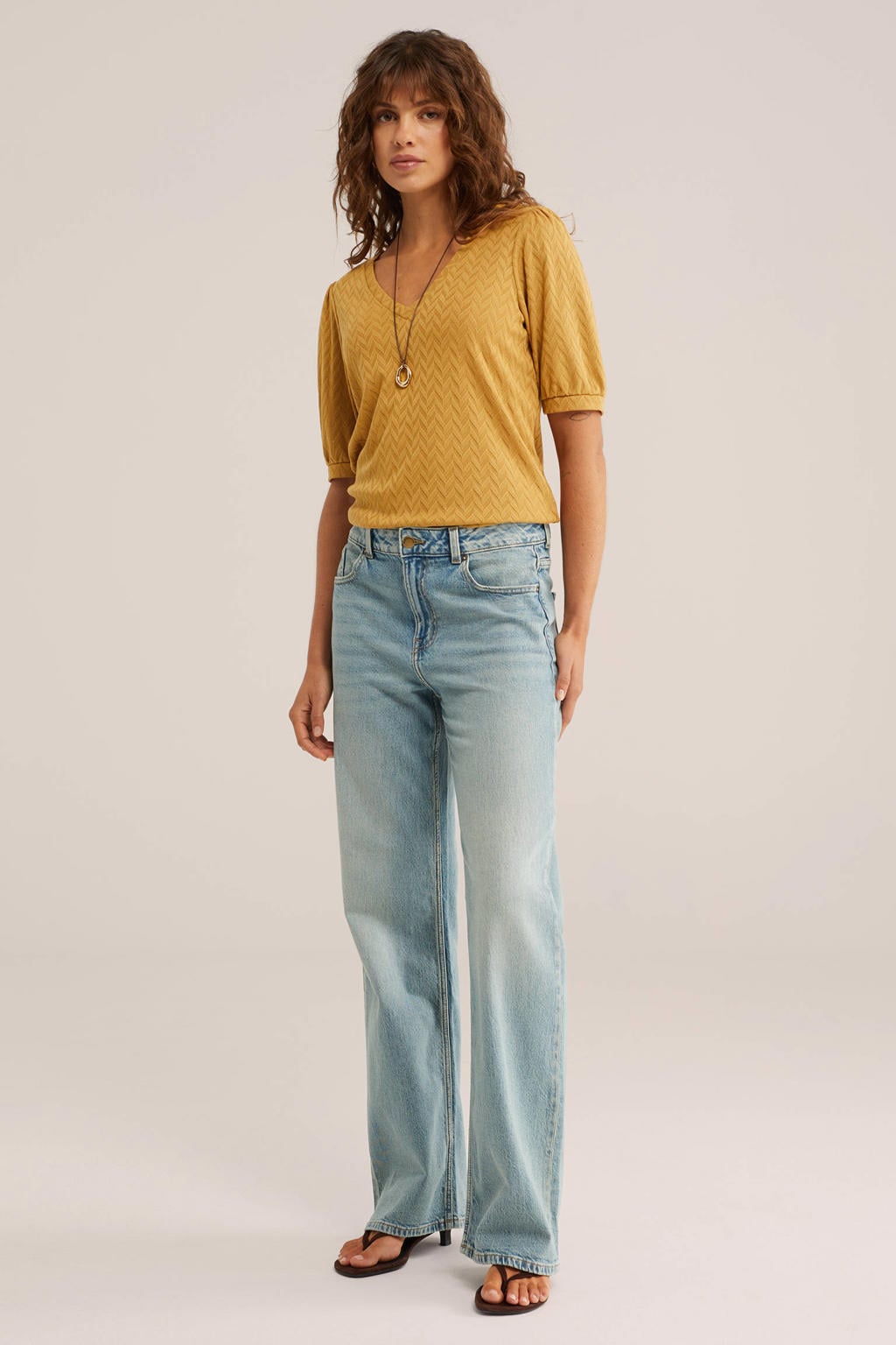 Okergele dames WE Fashion T-shirt van polyester met effen, korte mouwen en V-hals