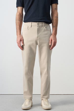 tapered jeans beige