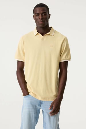 relaxed polo met contrast bies - geel