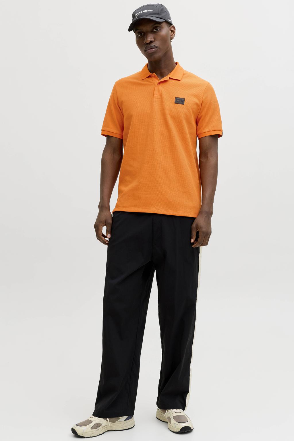 Oranje heren JACK & JONES regular polo met effen, korte mouwen, knoopsluiting en textuur