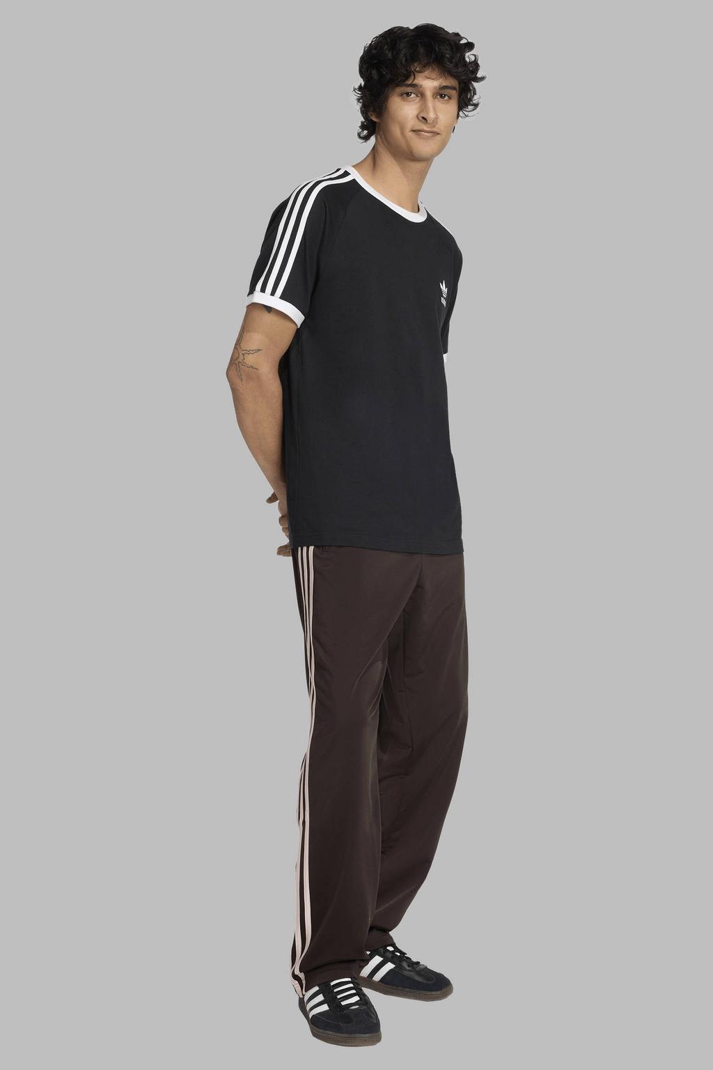 Donkerbruin en roze heren adidas Originals Firebird trainingsbroek van polyester met loose fit, elastische tailleband met koord en effen