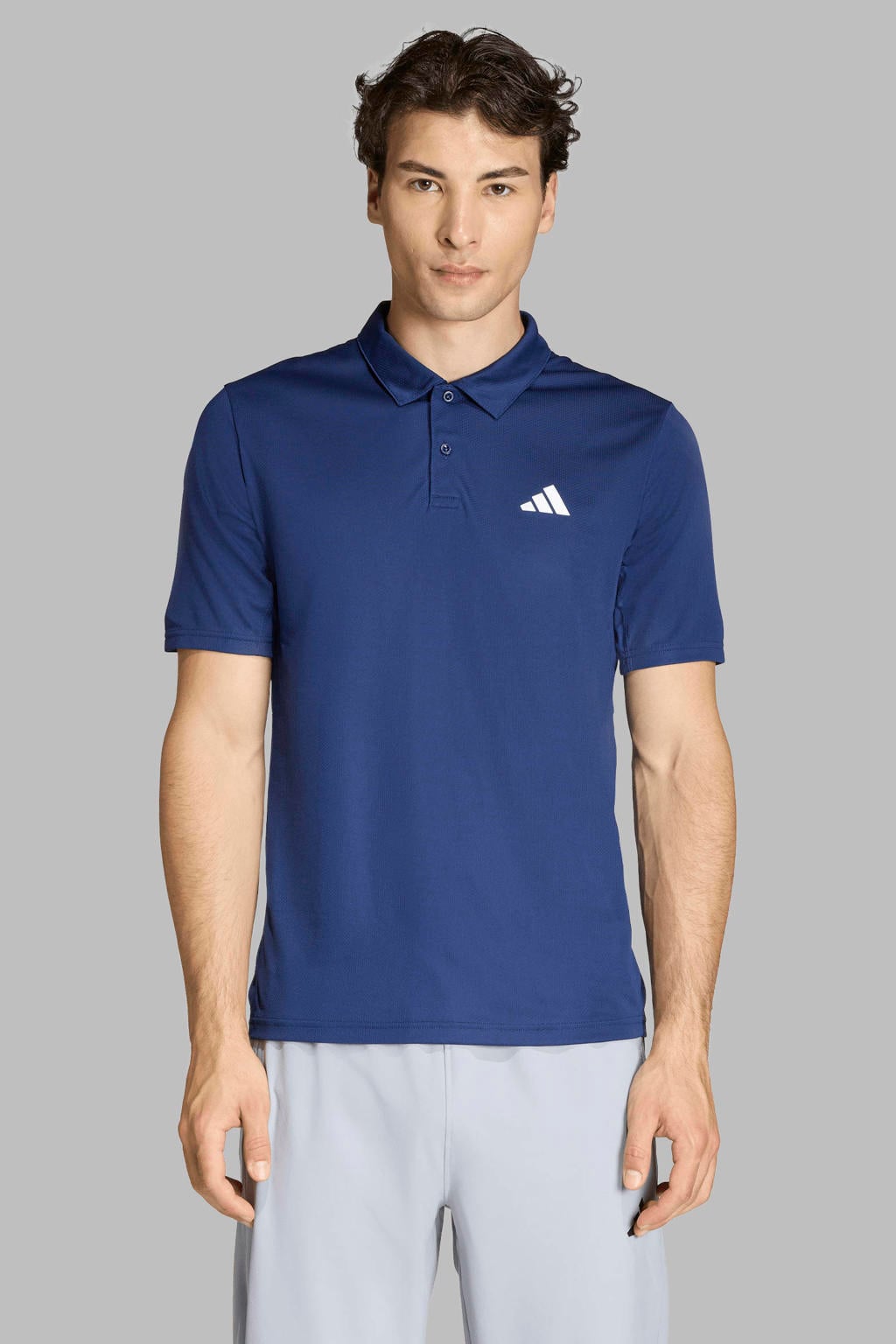 Donkerblauwe heren adidas Performance sportpolo van polyester met korte mouwen, klassieke kraag en knoopsluiting