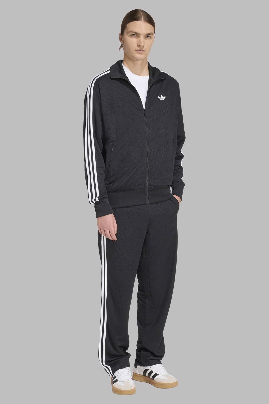 Zwart en witte heren adidas Originals Firebird trainingsbroek van polyester met loose fit, elastische tailleband met koord en effen