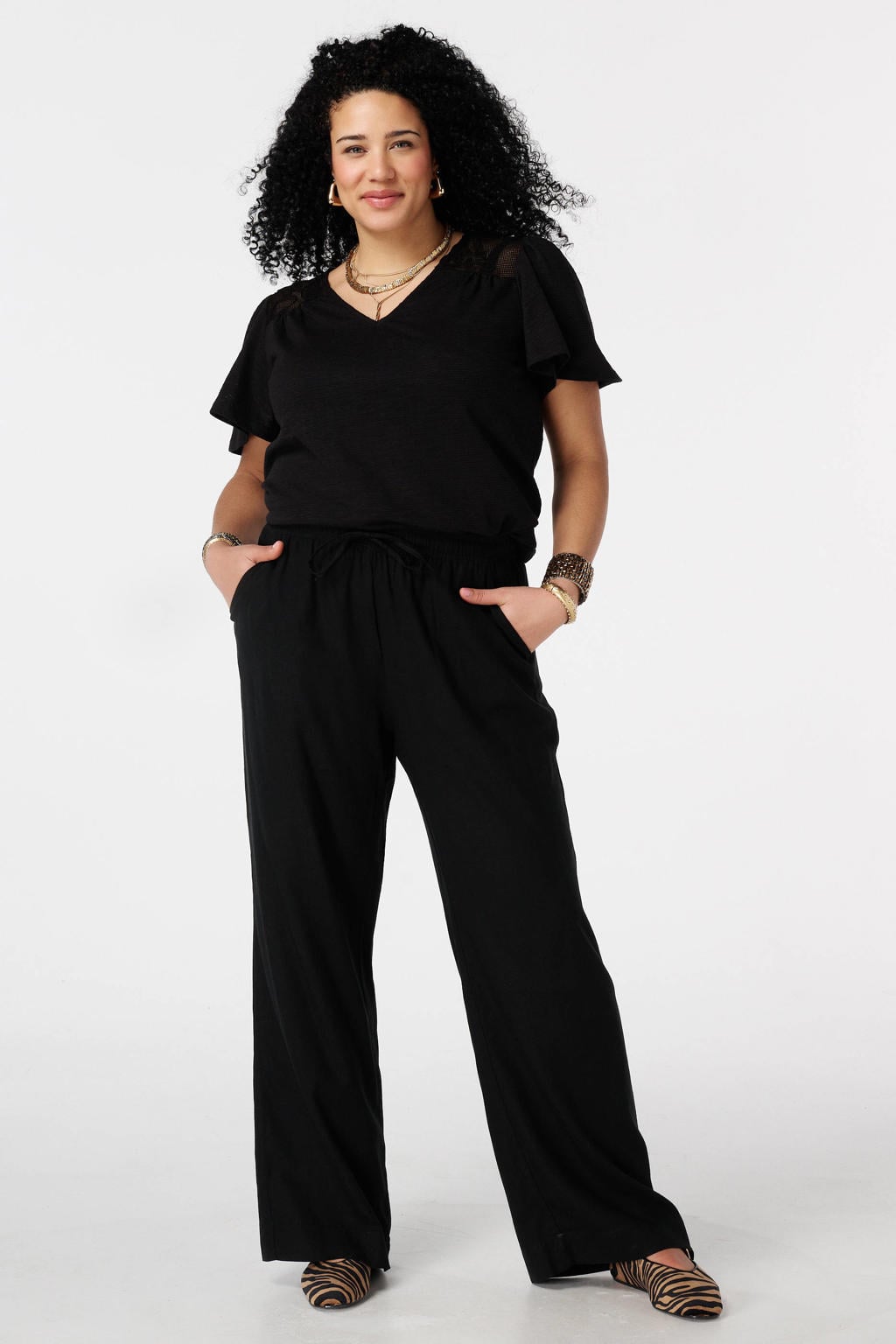 Zwarte dames MS Mode top van polyester met effen, korte mouwen en V-hals