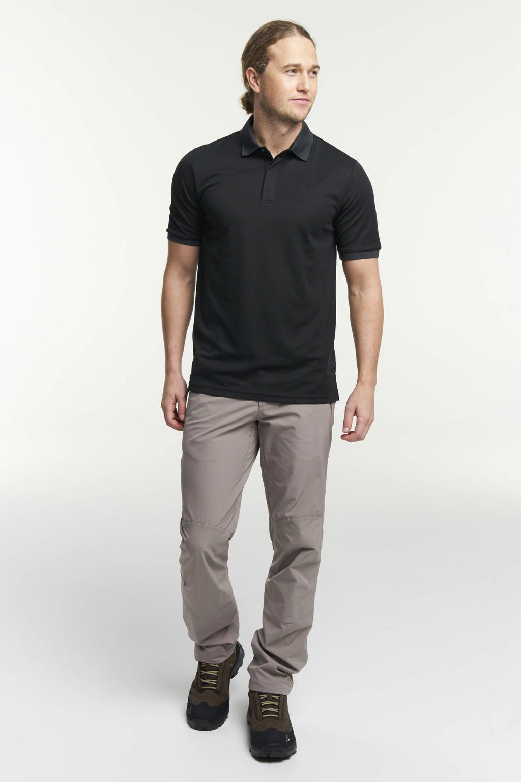 Zwarte heren Tenson outdoor polo met korte mouwen, klassieke kraag en knoopsluiting