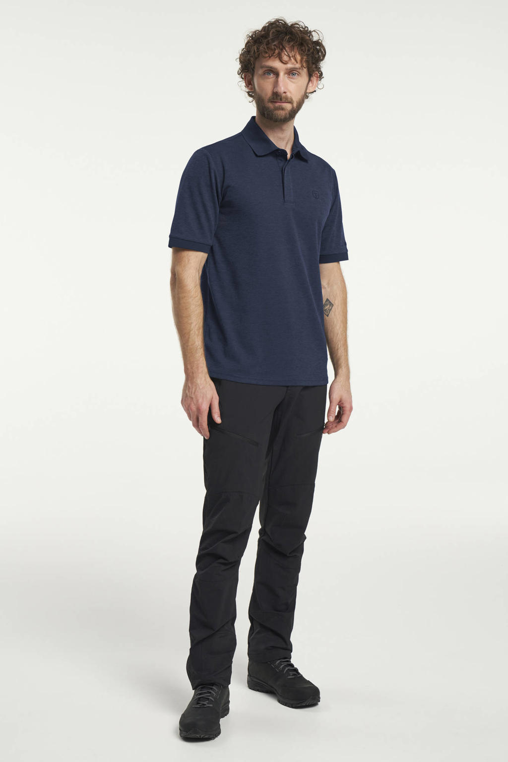 Donkerblauwe heren Tenson outdoor polo met korte mouwen, klassieke kraag en knoopsluiting