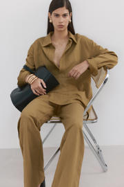 thumbnail: Mango bootcut high waist broek oker