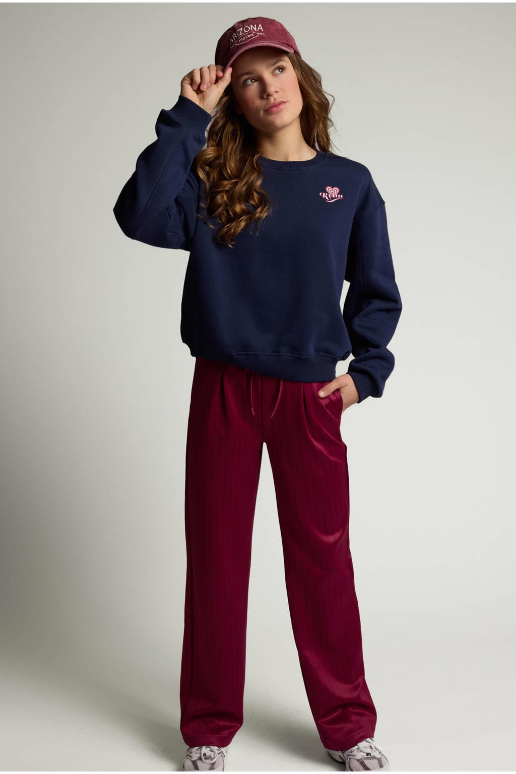 Donkerblauwe meisjes LOOXS 10sixteen rechtvallende sweater met backprint, lange mouwen, ronde hals en geribde boorden
