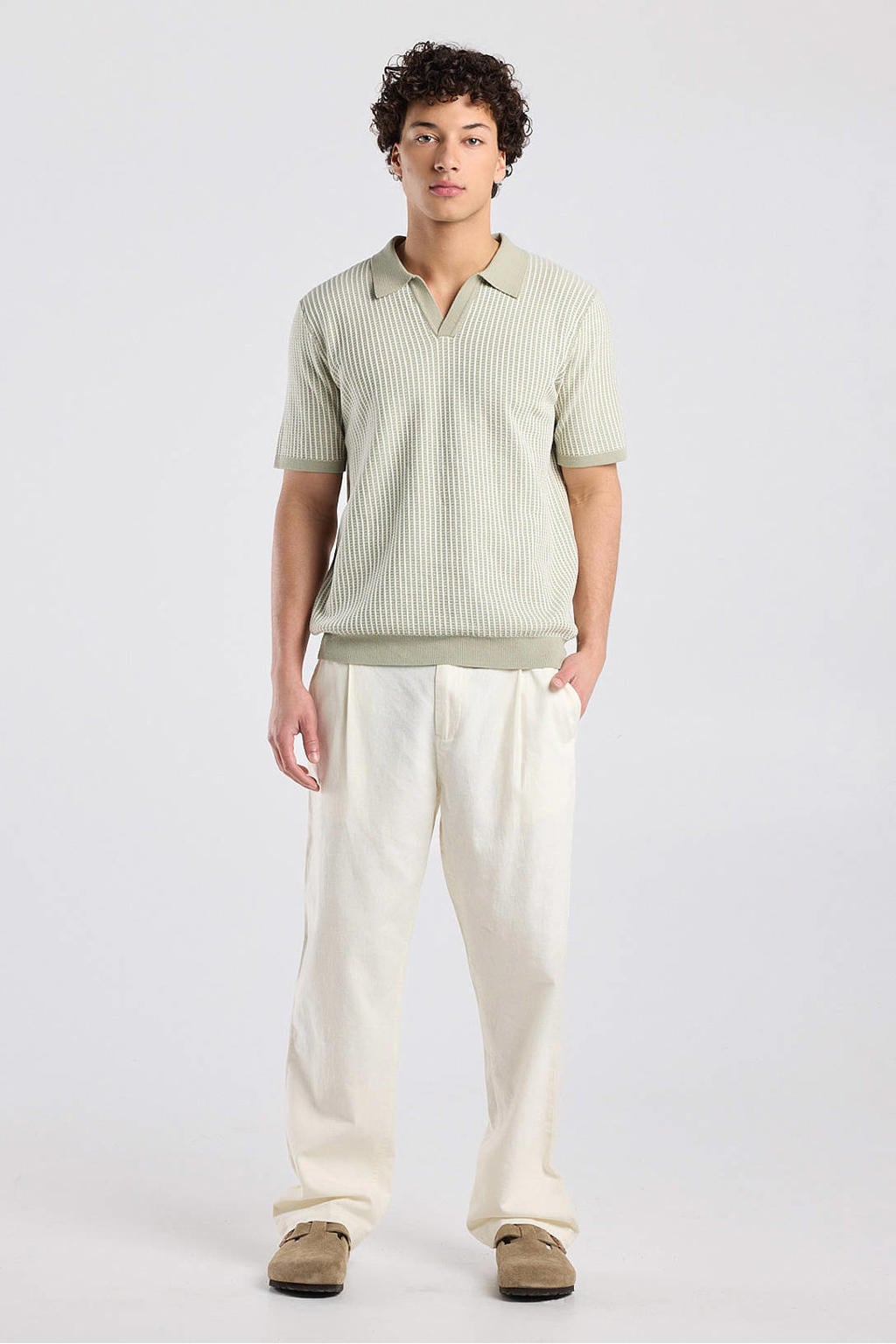 Groene heren America Today regular polo patroon met effen, korte mouwen, openvallende hals en geribde boorden