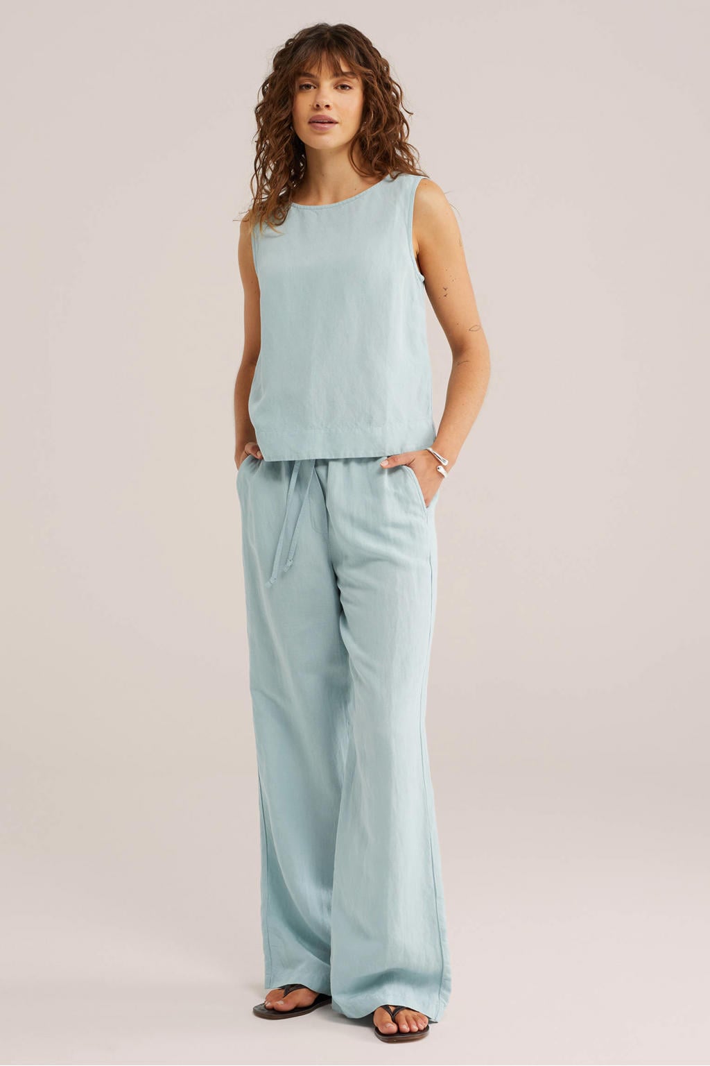 Lichtblauwe dames WE Fashion geweven top van viscose met effen en ronde hals