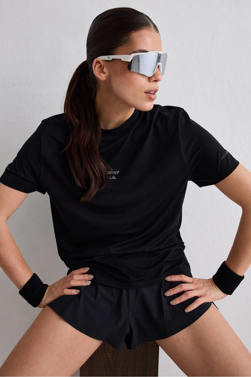 Zwarte dames Aim'n Le Run hardloopshirt van polyester met korte mouwen en ronde hals