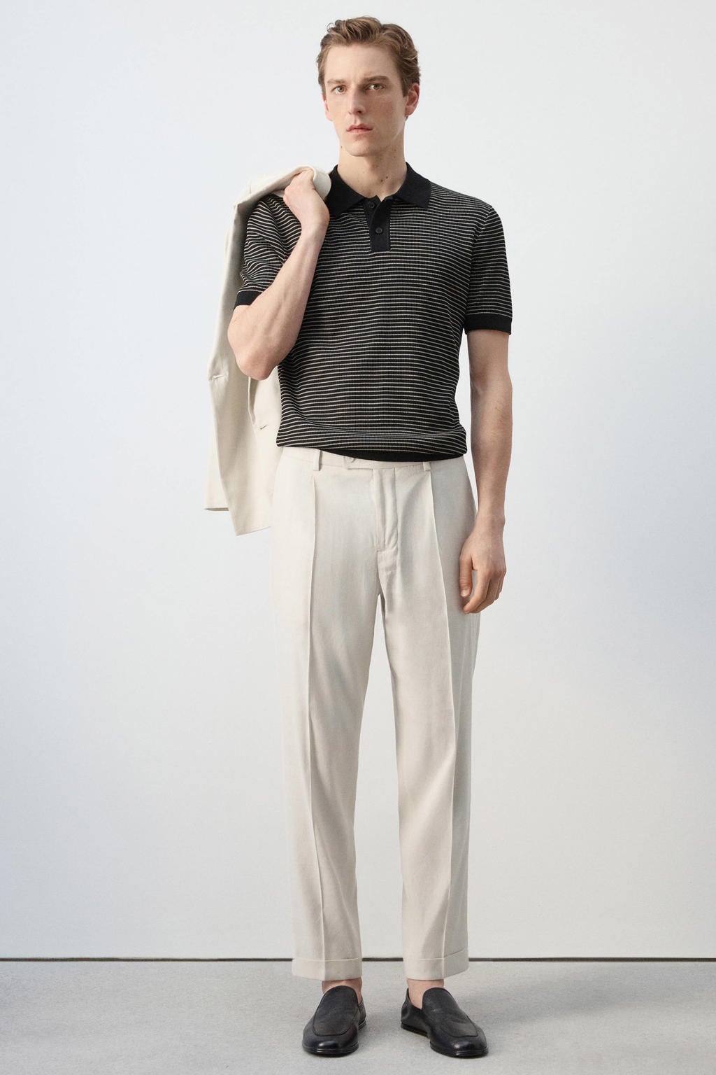Zwarte heren Mango Man regular gestreepte polo van viscose met korte mouwen en knoopsluiting