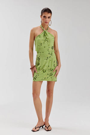 gebloemde cocktailjurk met pailletten groen