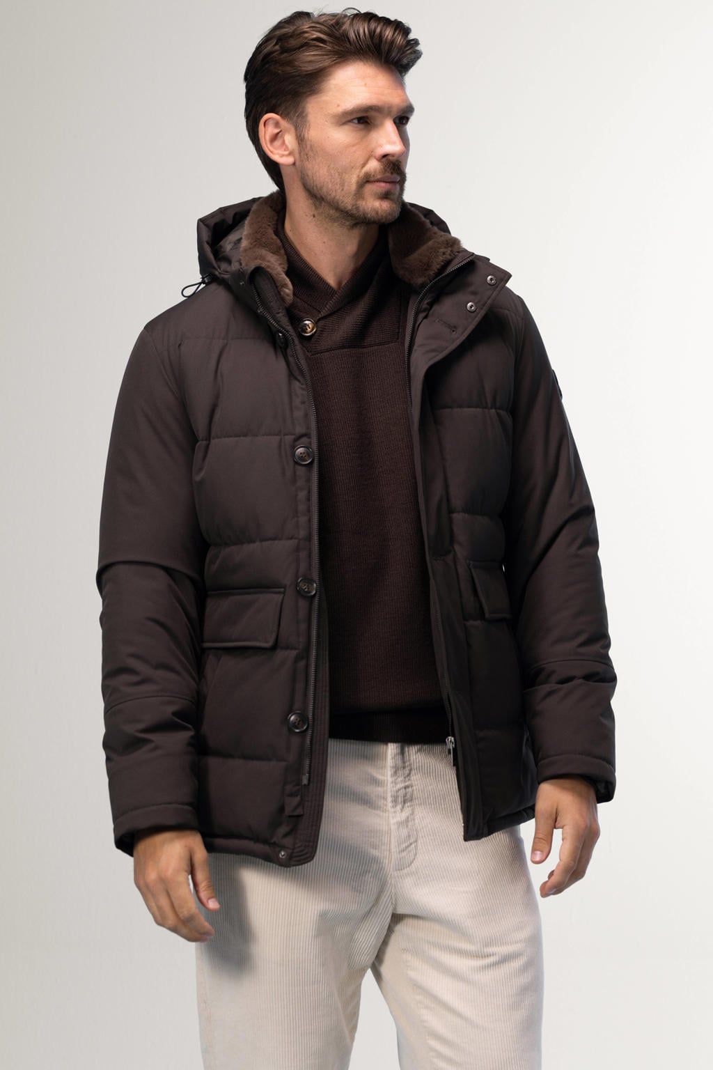 Donkerblauwe heren Agiato gewatteerde winterjas van polyester met effen, lange mouwen, capuchon, rits- en knoopsluiting en doorgestikte details