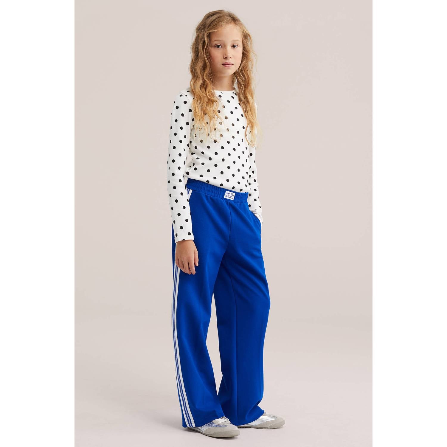 WE Fashion loose fit gestreepte joggingbroek blauw