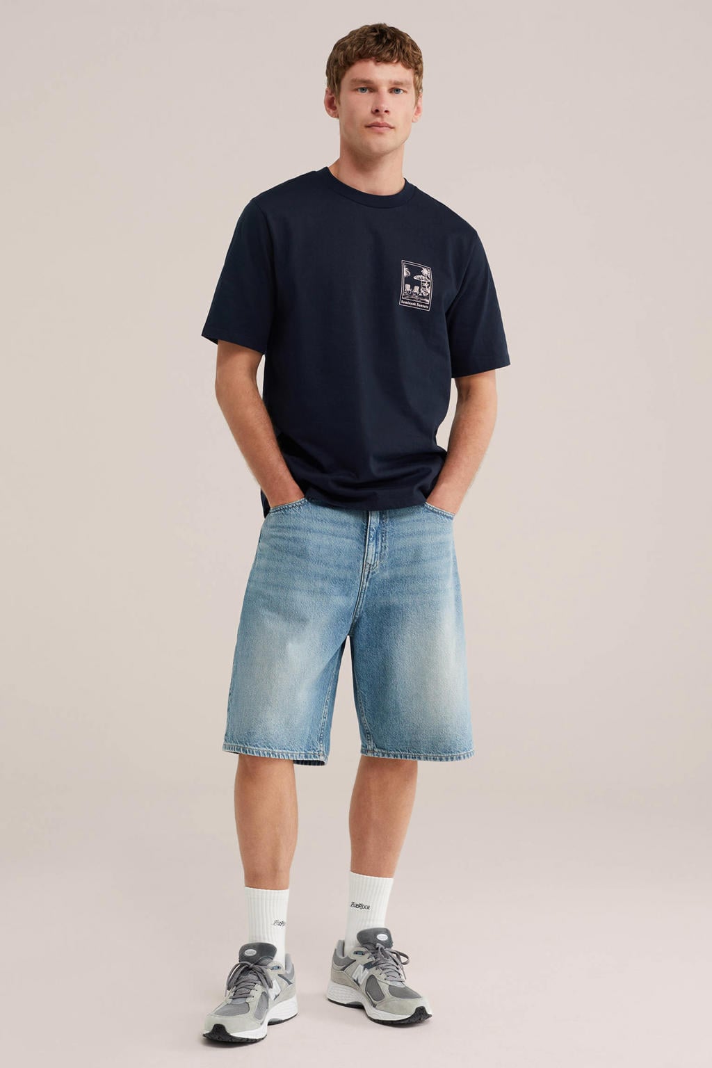 Donkerblauwe heren WE Fashion relaxed T-shirt van katoen met printopdruk, korte mouwen en ronde hals