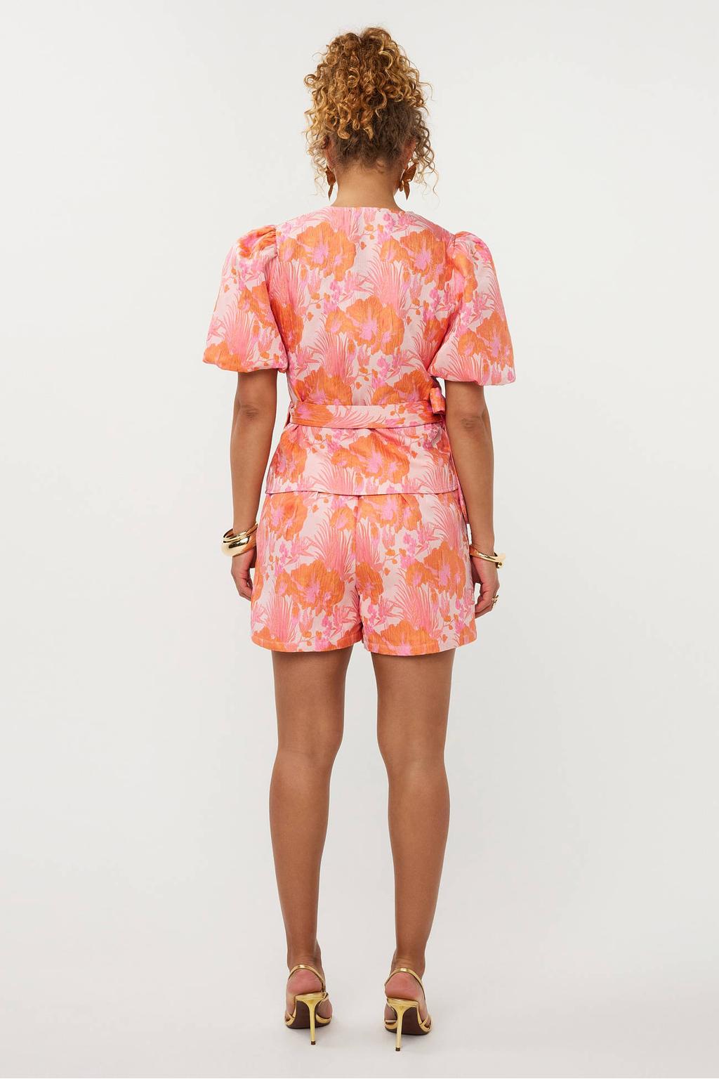 Roze en oranje dames Ydence gebloemde top van polyester met korte mouwen, V-hals en overslag detail