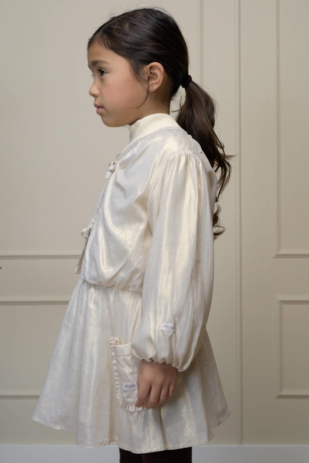 Gouden meisjes Le Chic korte A-lijn rok gemaakt van polyester en met elastische tailleband