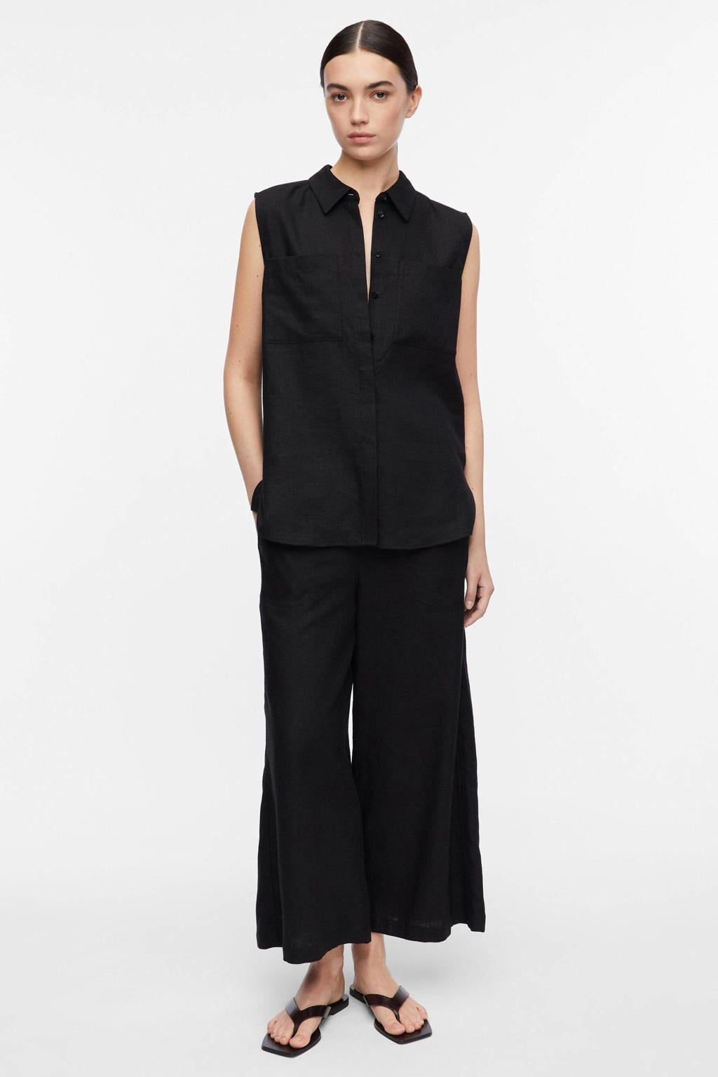 Zwarte dames comma blouse van linnen met effen, klassieke kraag en knoopsluiting