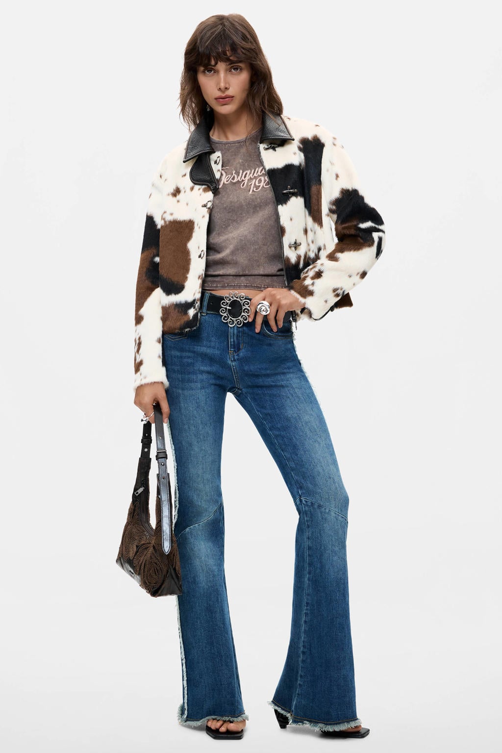 Bruin en ecru dames Desigual faux fur winterjas van polyester met koeienprint, lange mouwen en klassieke kraag