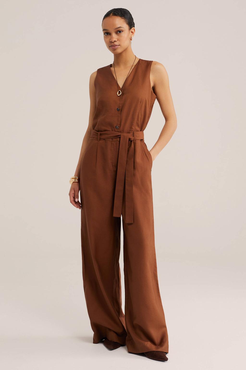 Lichtbruine dames WE Fashion jumpsuit van viscose met effen, V-hals, rits, haak- en knoopsluiting en ceintuur
