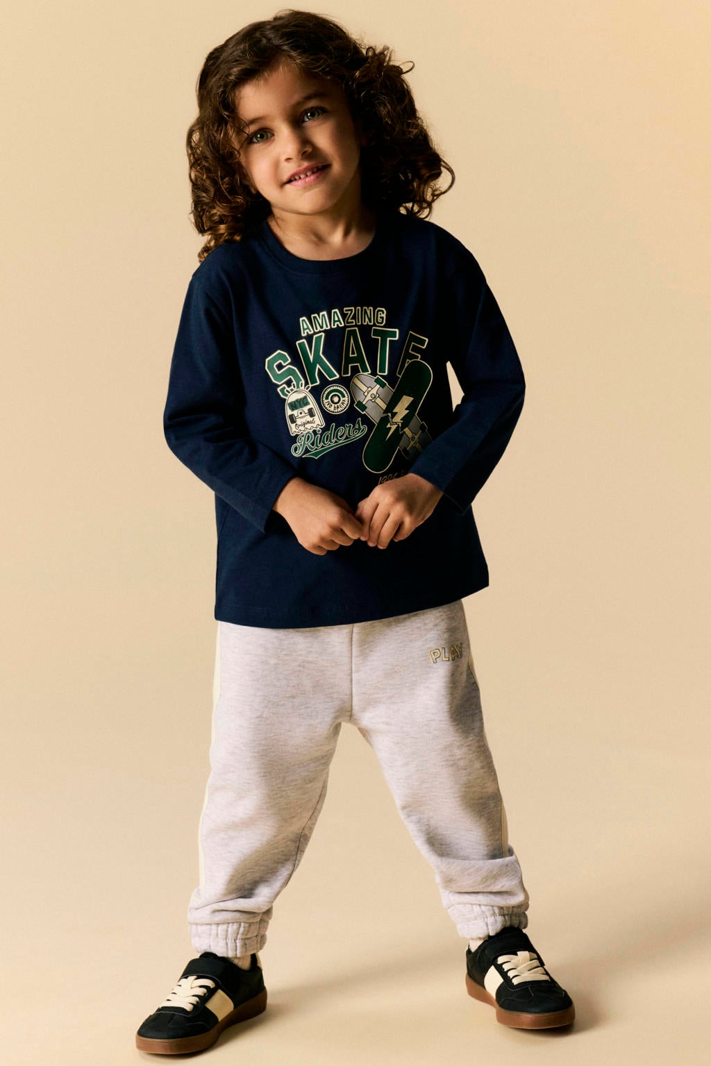 Donkerblauwe jongens NAME IT MINI rechtvallende longsleeve van stretchkatoen met printopdruk, lange mouwen en ronde hals