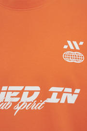 thumbnail: WE Fashion relaxed fit T-shirt met print - oranje