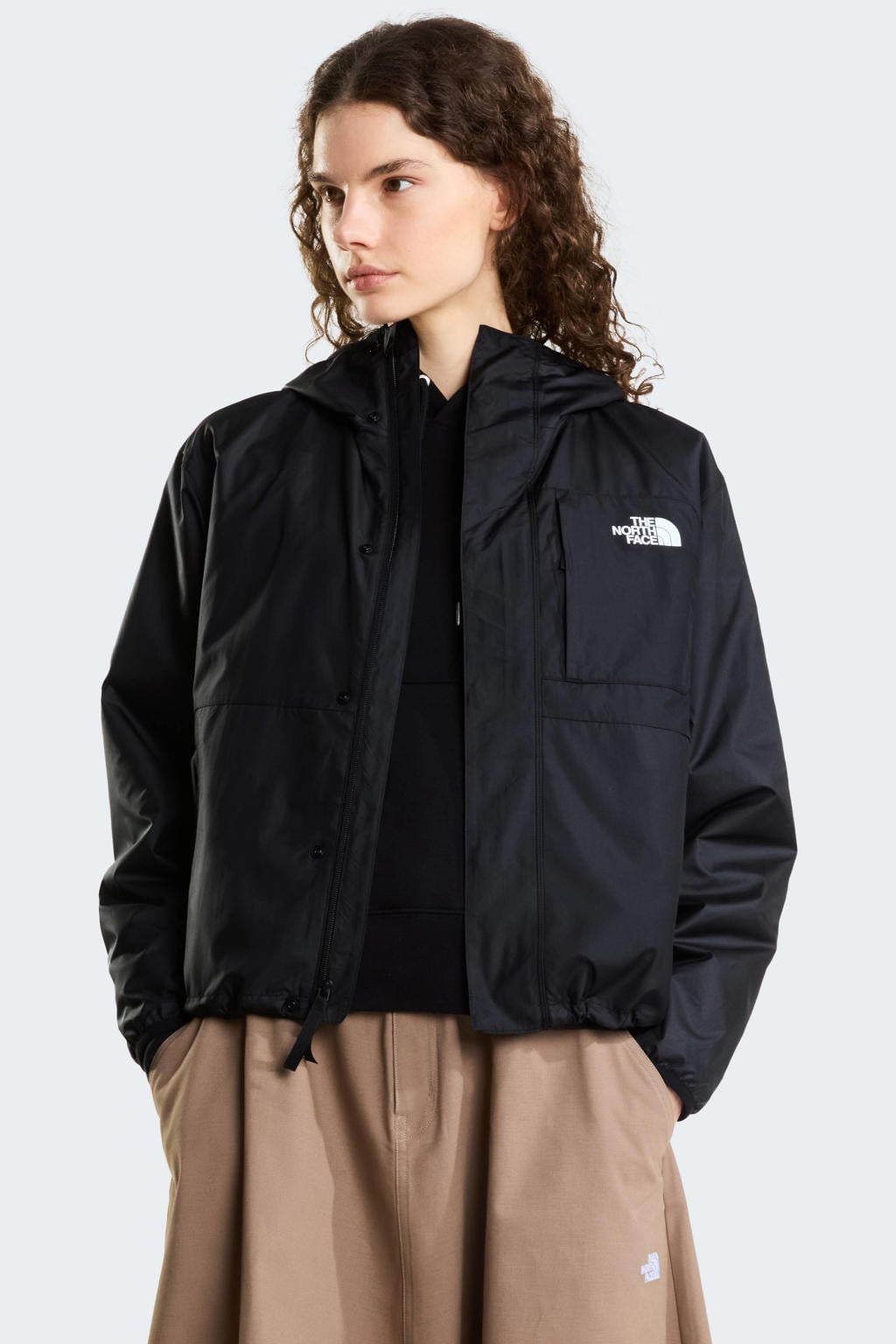 Zwarte dames The North Face outdoorjas van polyester met effen, lange mouwen, capuchon en rits met windvanger