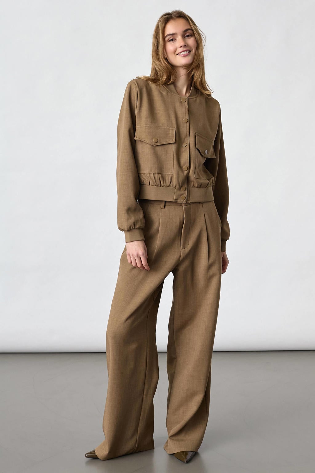 Zandkleurige dames SisterS Point bomberjack van polyester met effen, lange mouwen, opstaande kraag en elastische boord