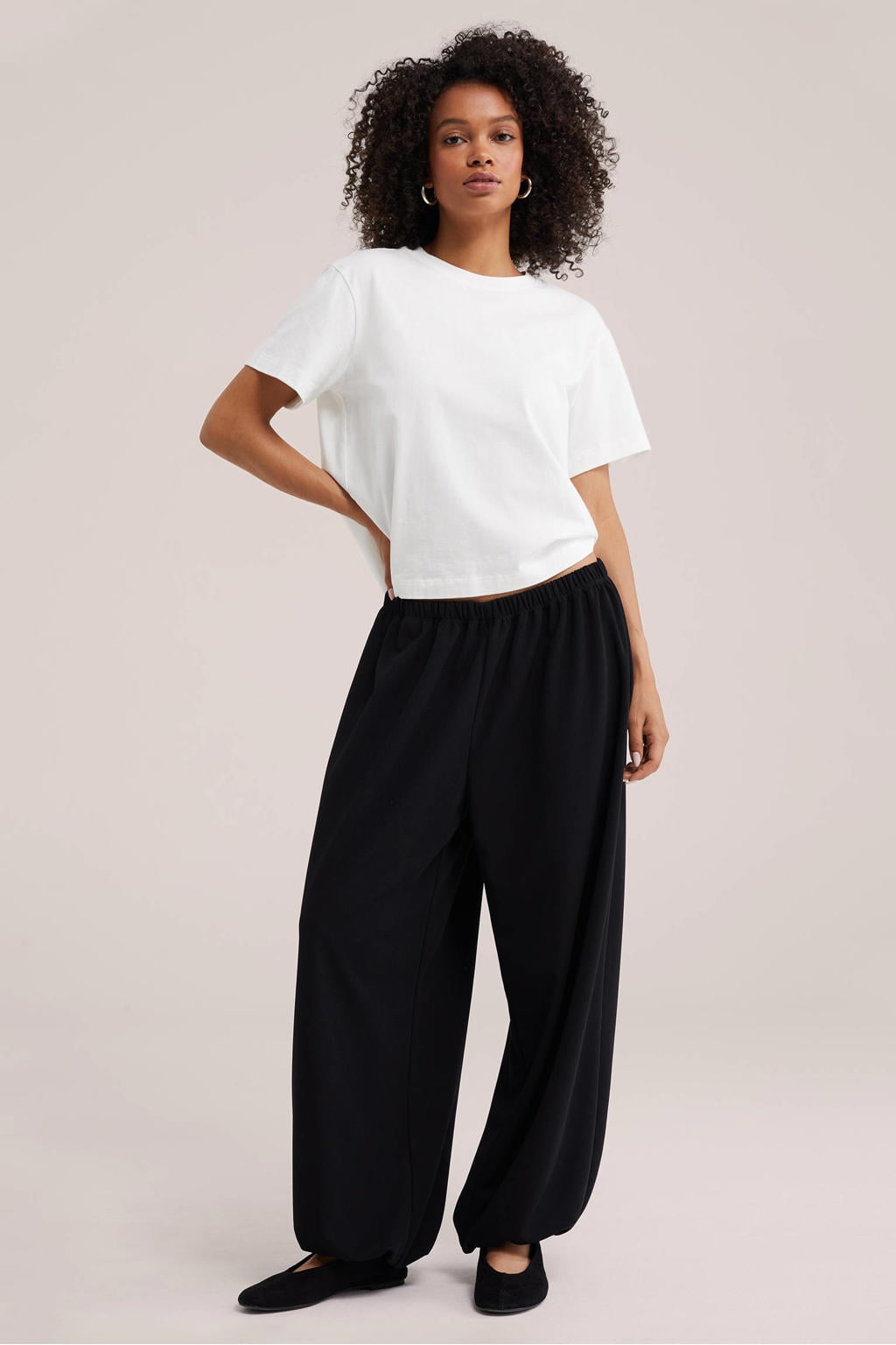 Zwarte dames WE Fashion ballonbroek van polyester met regular waist, elastische tailleband en effen