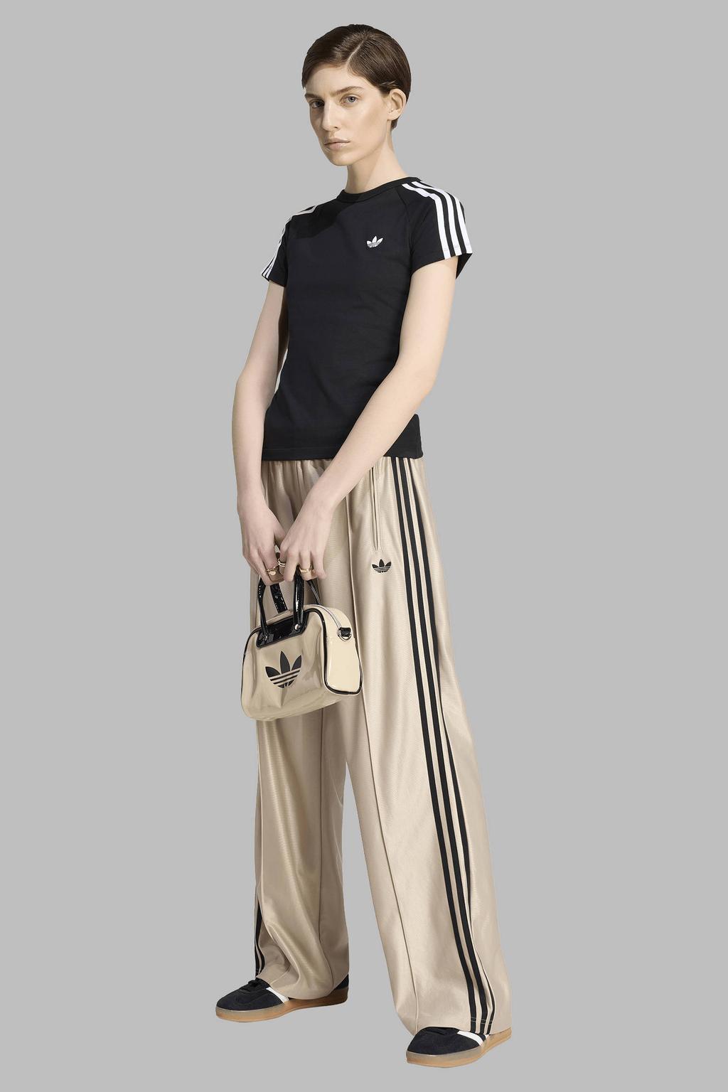 Zand en zwarte dames adidas Originals Firebird loose fit broek van polyester met regular waist, elastische tailleband met koord en effen