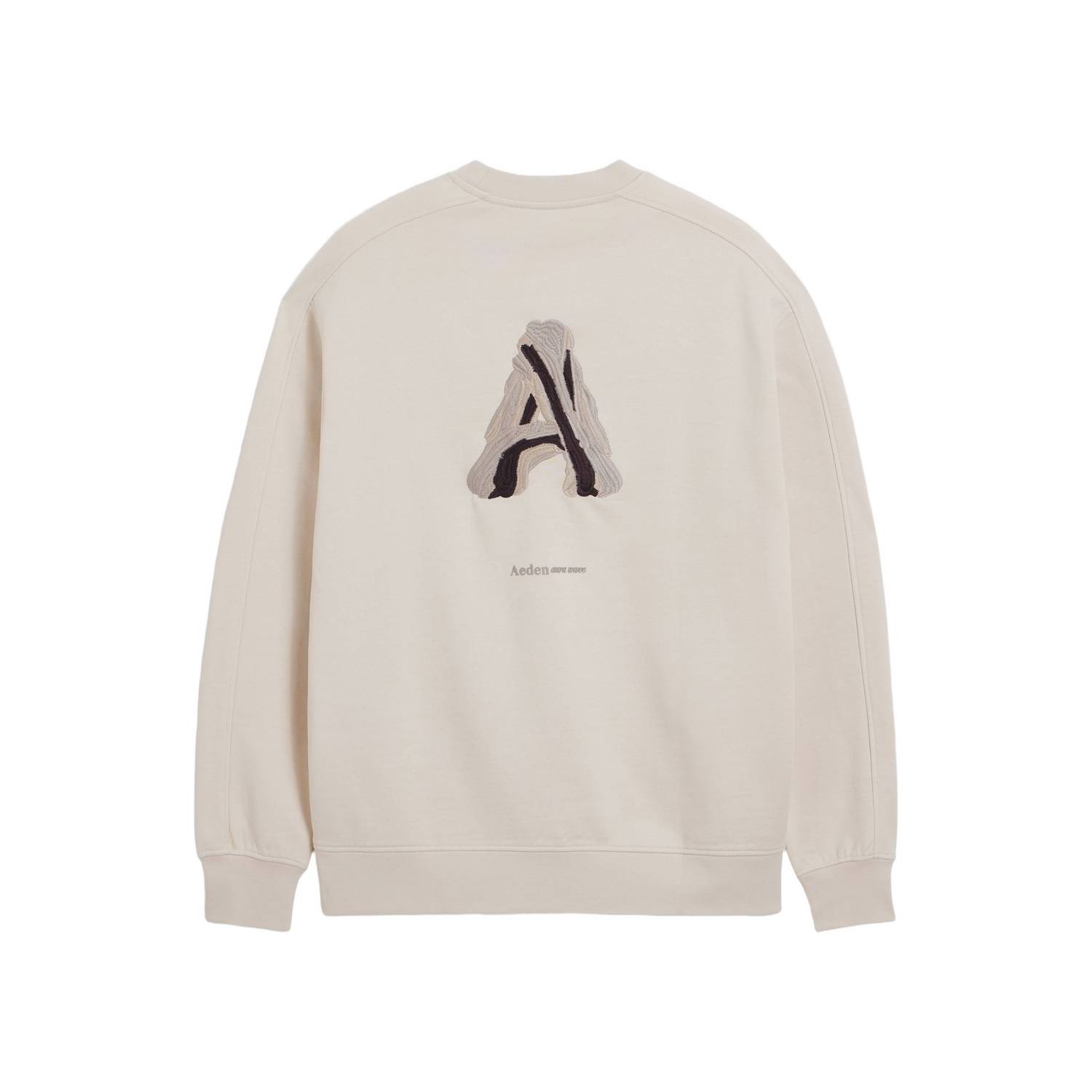 Aeden oversized trui met borduursels en backprint beige