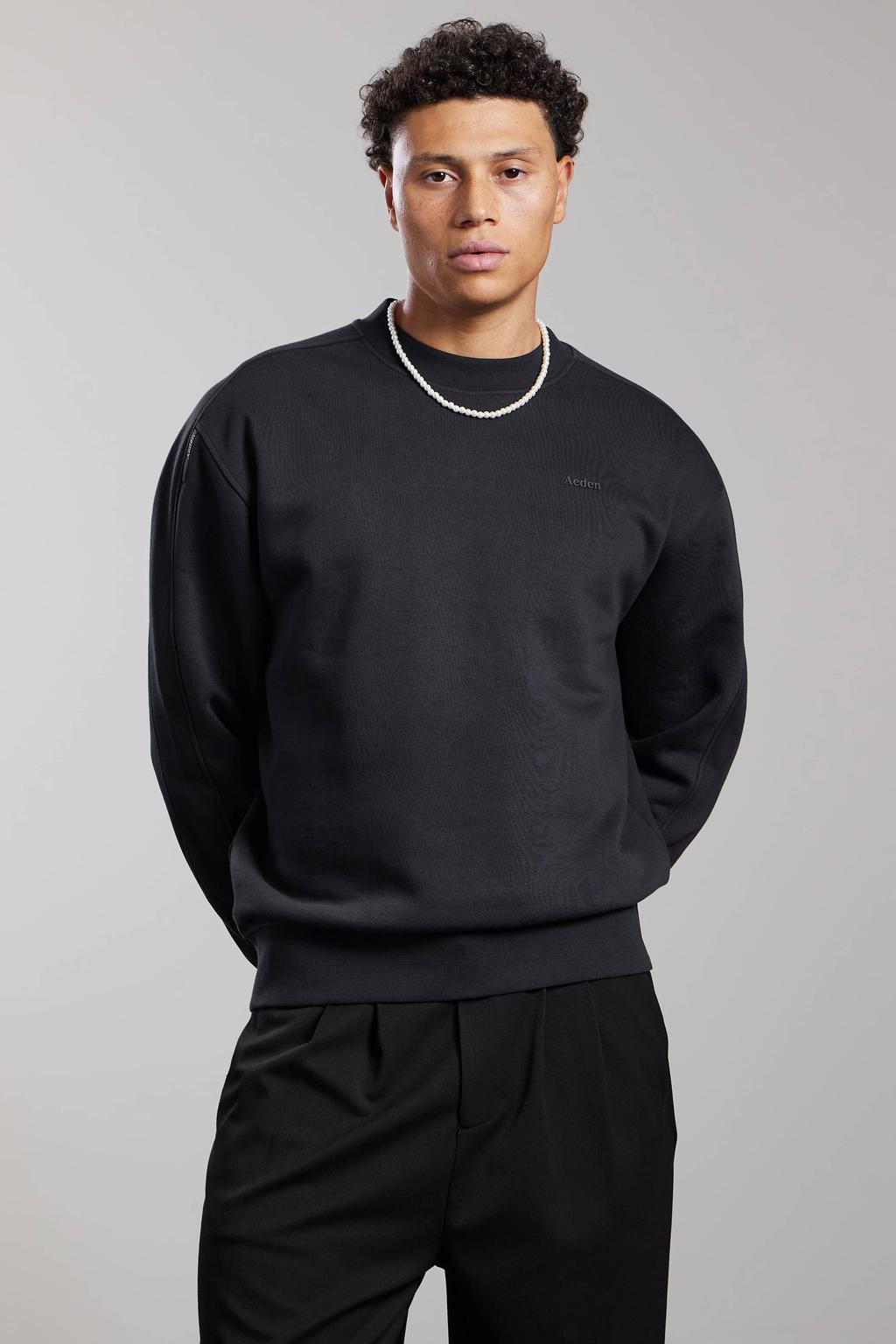 Aeden relaxed fit sweater met backprint - zwart