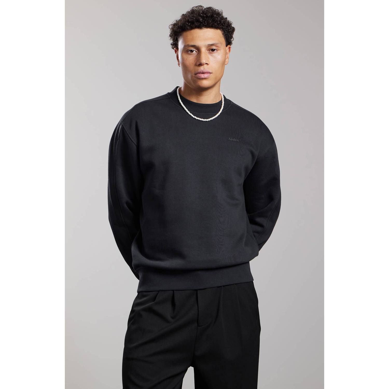 Aeden relaxed fit sweater met backprint zwart
