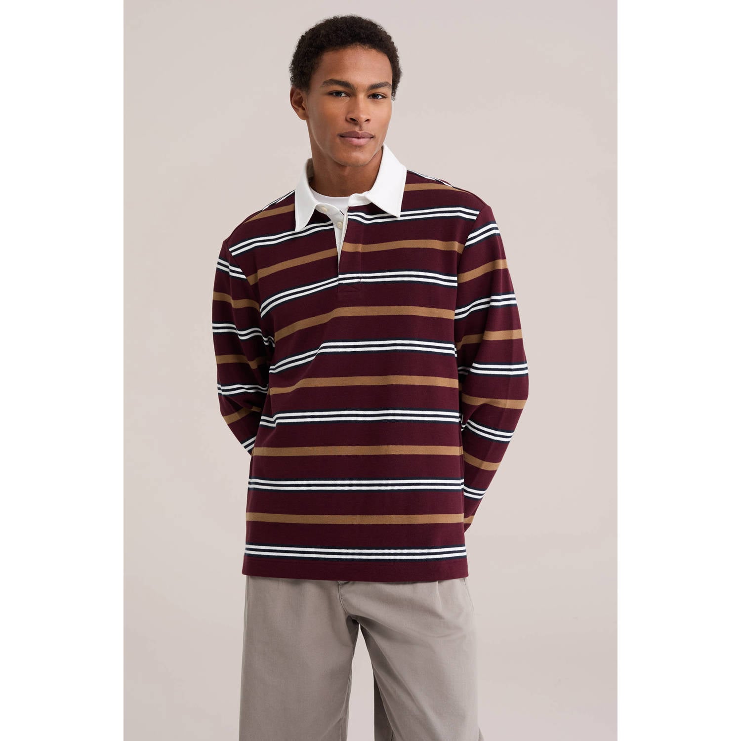 WE Fashion relaxed fit gestreepte polo umberwine