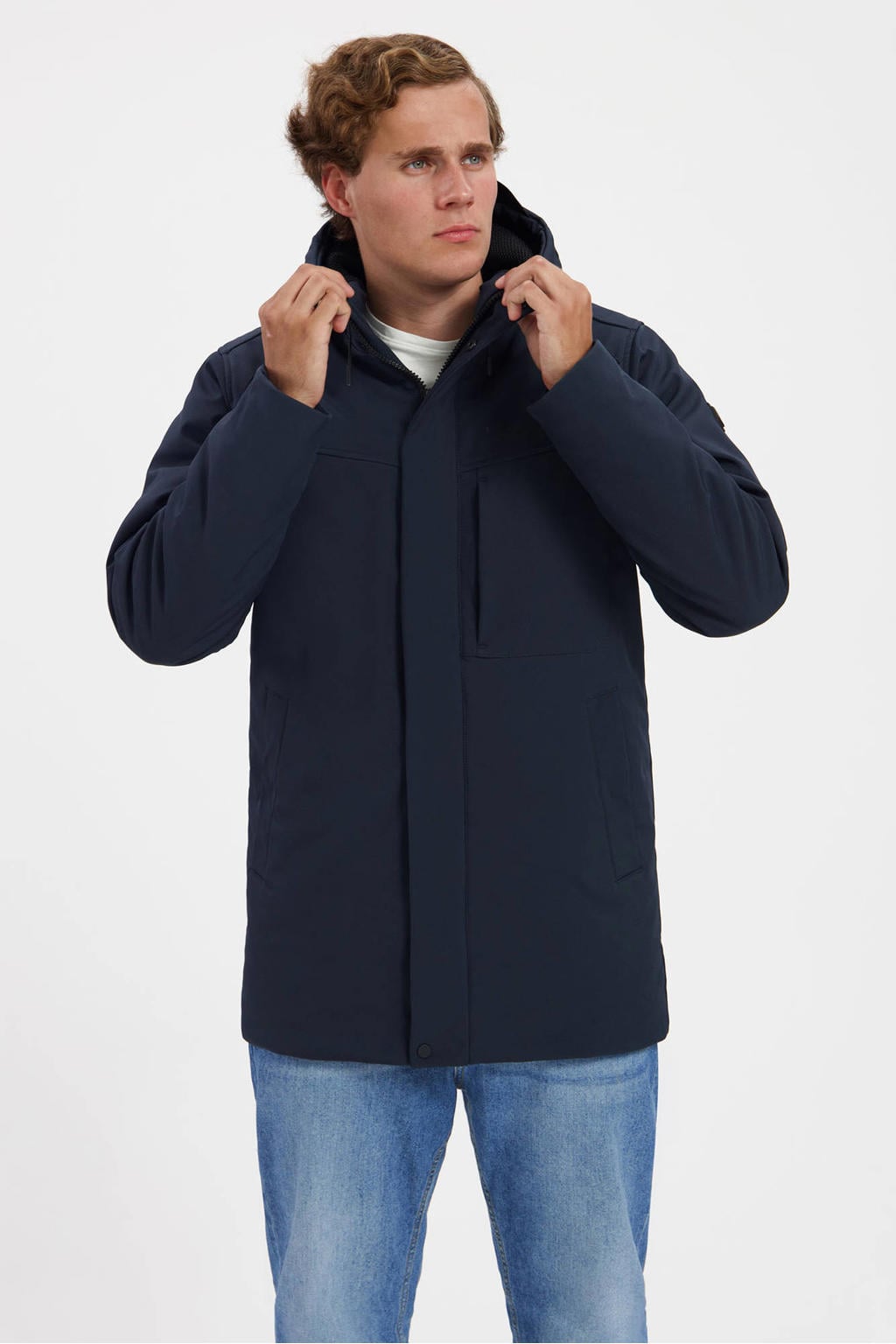 Donkerblauwe heren Kjelvik Leonn softshell jas met lange mouwen, capuchon en 2-way rits met windvanger