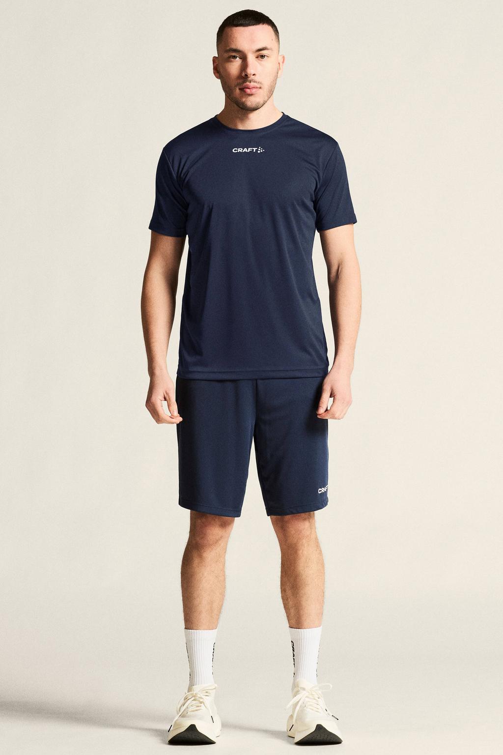 Donkerblauwe heren Craft Squad Go sportshirt van polyester met effen, korte mouwen en ronde hals