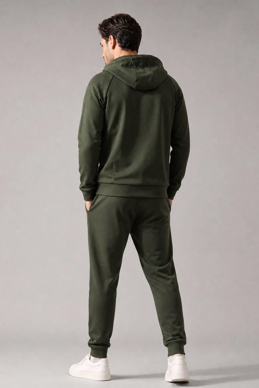 Groene heren Sjeng Sports March trainingsjack van polyester met lange mouwen, capuchon en ritssluiting