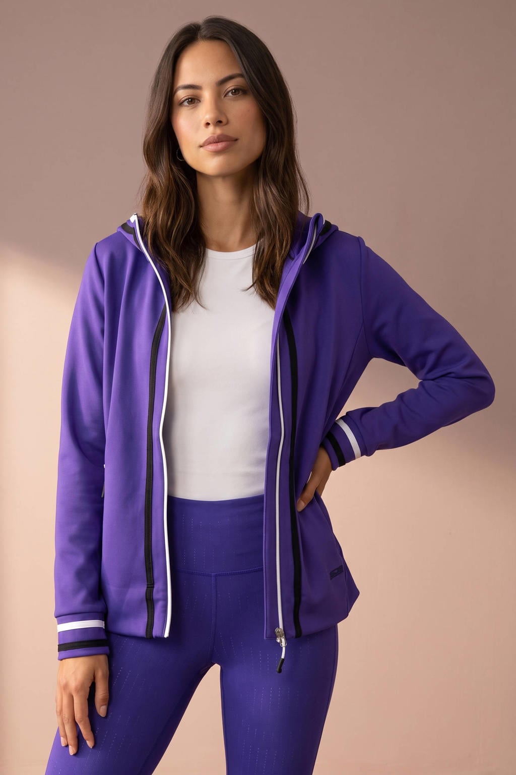 Paarse dames Sjeng Sports Filomena trainingsjack van polyester met lange mouwen, capuchon en ritssluiting