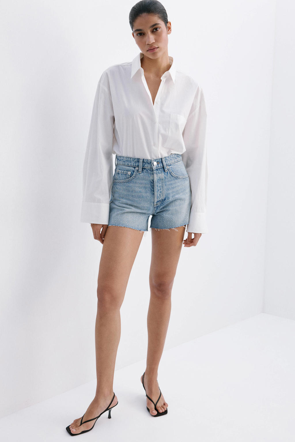 Light blue denim dames Mango slim fit regular waist short van denim met effen