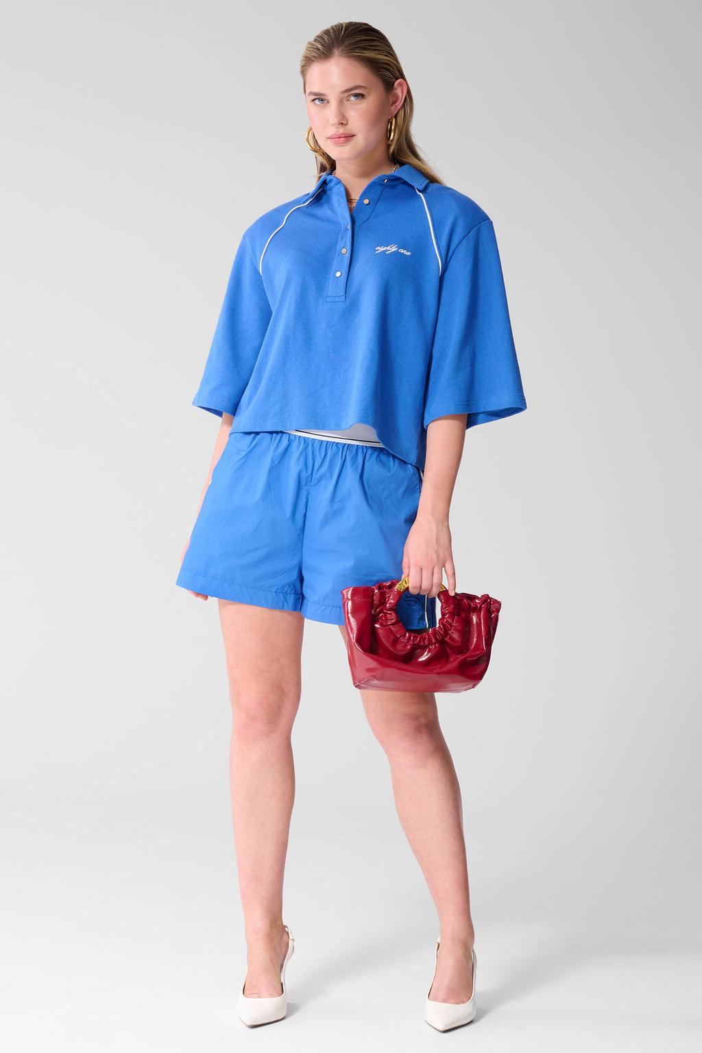 Blauw en witte dames Shoeby polo van katoen met logo dessin en driekwart mouwen