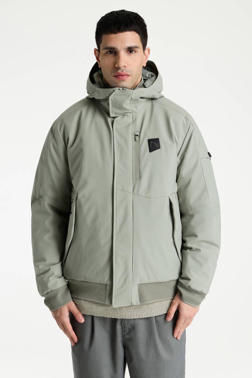 Groene heren CHASIN' wintersoftshelljas van polyester met effen, lange mouwen, capuchon, rits- en drukknoopsluiting en geribde boorden