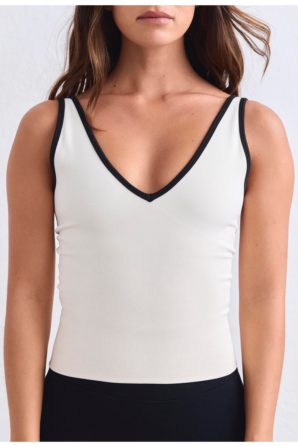 Crème dames Aim'n Shape Seamless sporttop van polyester met V-hals